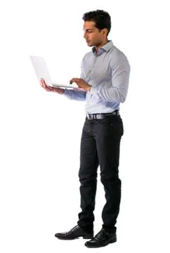 Young man working with computer standing Stock Photos