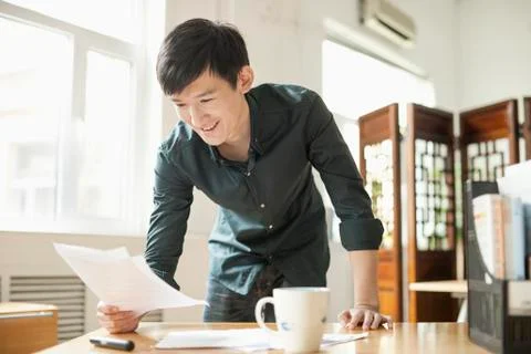 Young Man Working in Creative Office Stock-Fotos