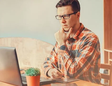Young man working with graphics tablet Stock Photos