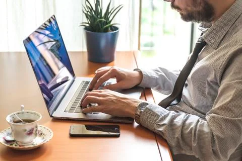 Young man working on his Computer Stock Photos