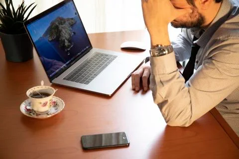 Young man working on his Computer Stock Photos