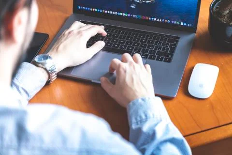 Young man working on his Computer Stock Photos