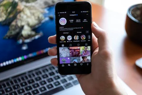 Young man working on his Computer and on a smartphone Foto stock