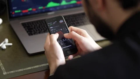A young man working on his laptop from home Stock Footage 129304439