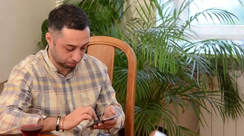 Young Man Working on His Smart Phone Stock Footage 49810225