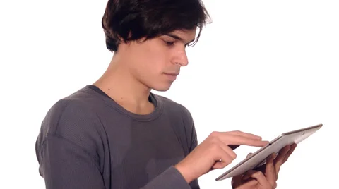 Young man working on his tablet computer Stockbeeldmateriaal 29987212