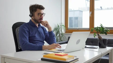 Young man working from home as call center agent Stock Footage 162467443