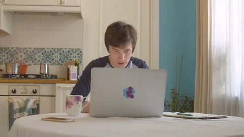 Young man working from home Stock Footage 130967106