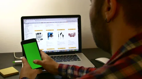 Young Man Working At Home, Writting A Message On His Smartphone, Green Screen Stock Footage 64045302