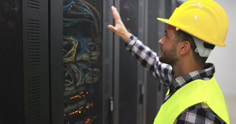 Young man working for inspection inside server data network center Stock Footage 149302617