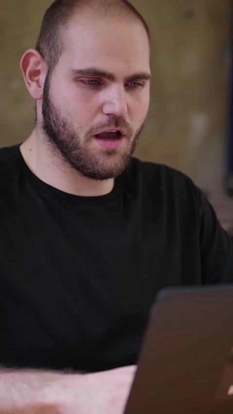 Young Man Working on Laptop and Yawning from Boredom Stock Footage 328644509