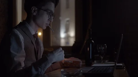 Young man working with laptop Stock Footage 124577839