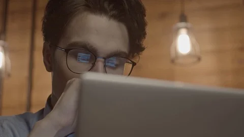 Young man working with laptop Video stock 125080056