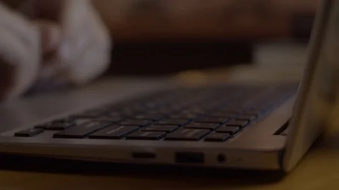 Young man working with laptop Stock Footage 125080513