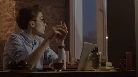 Young man working with laptop Stock Footage 125081043