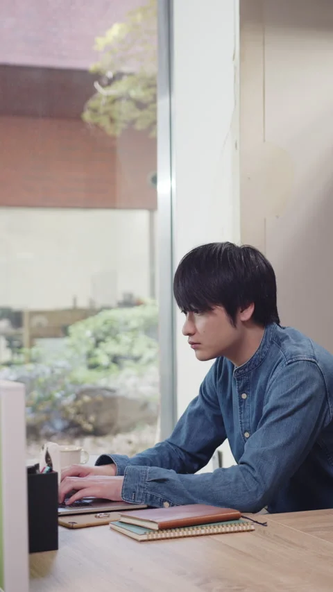 Young man working with laptop 스톡 동영상 161920528