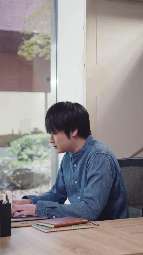 Young man working on a laptop  Video stock 161920567