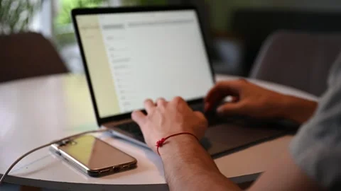 Young man working on laptop Stock Footage 285785699