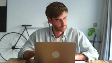 Young Man Working on Laptop at Home Office, Taking 스톡 동영상 333200567