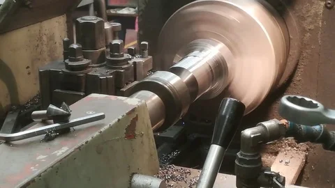 A young man working on a lathe Stock Footage 83142245