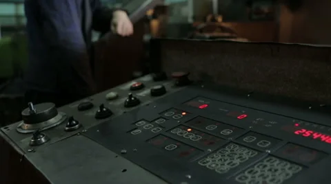 Young man working on the machine Stock Footage 47197699