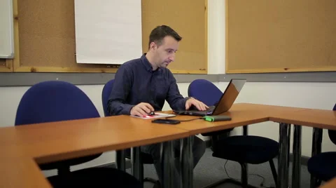 Young man working in the office Stock Footage 45125629