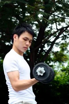 Young man working out Stock Photos
