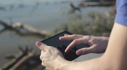 Young man working outdoors with tablet. 스톡 동영상 55336255