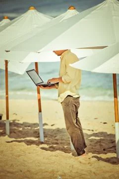 Young man working remotely Stock Photos