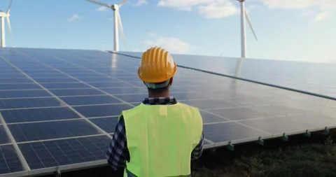 Young man working at renewable energy farm - Eco and technology concept Stock Footage 149302734