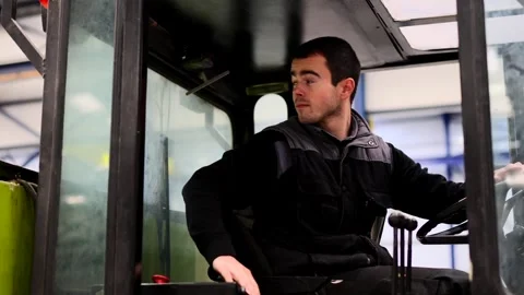 Young man working in a storehouse Stock Footage 260140365