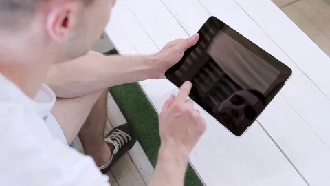 Young Man Working On a Tablet  Stock Footage 82442626