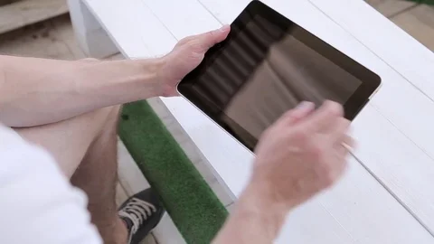 Young Man Working On a Tablet  Stock Footage 82442630