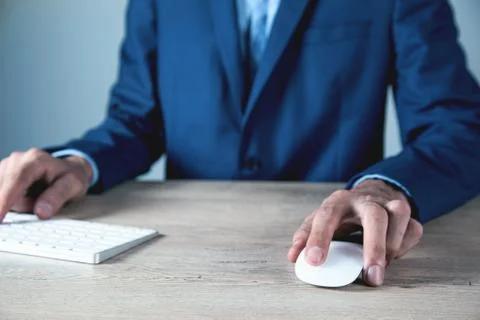 Young man works with computer Stock Photos
