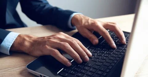 Young man works with computer Stock Photos