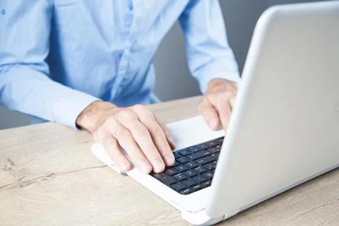 Young man works with computer Stock Photos