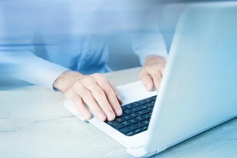 Young man works with computer Stock Photos