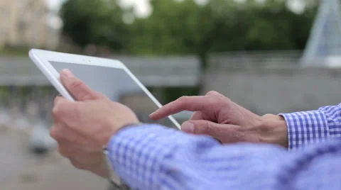 Young Man Works on the Tablet Stock Footage 64170370