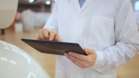 A Young Man Writes On A Robot Display. Stock Footage 106780328
