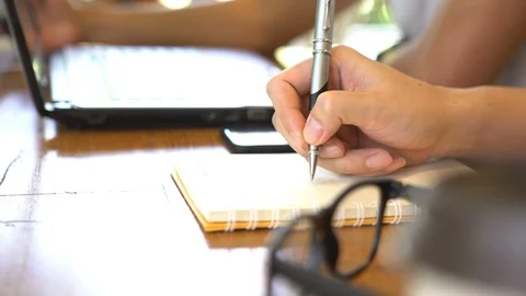 Young man writing diary Stock Footage 88323271