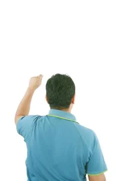 Young man writing something, back view Stock Photos