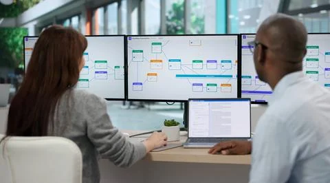 Young Manager And Consultant Using Digital Workflow Software To Optimize Busi Stock Photos