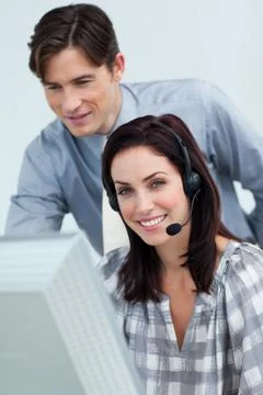Young manager checking his employee's work Stock Photos