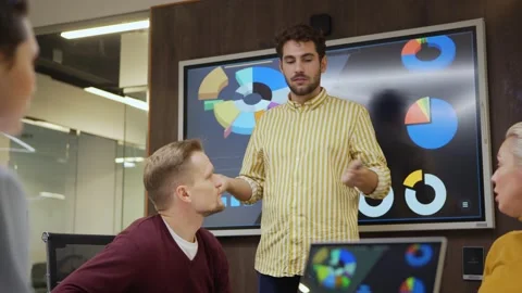 Young manager presenting financial analysis Stock Footage 132818189