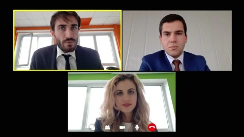 Young manager reports on video cathe results of the meeting to his collaborators Video stock 140389712