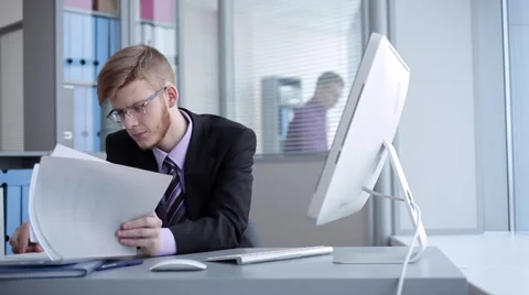 Young Manager Thinking About the Answer to the Letter Stock Footage 61730230