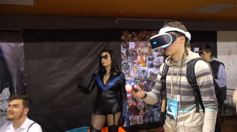 Young manin Virtual Reality Glasses. VR. Belarussian comic con. Minsk. 2016. Stock Footage 68982157
