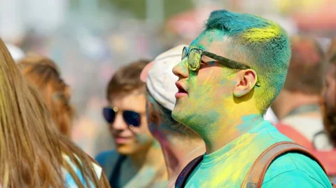 Young man's face covered in paint Video stock 51817704