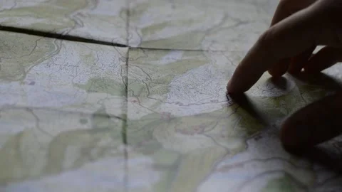 Young man's hand use earth map for travel. international map concept 库存影片 197746745