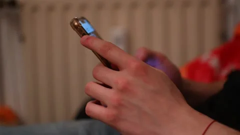Young man's hands with phone Stock Footage 270762041